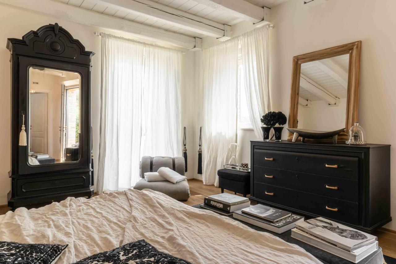 Casavostra - Ambience Suites Ostra Vetere Bagian luar foto