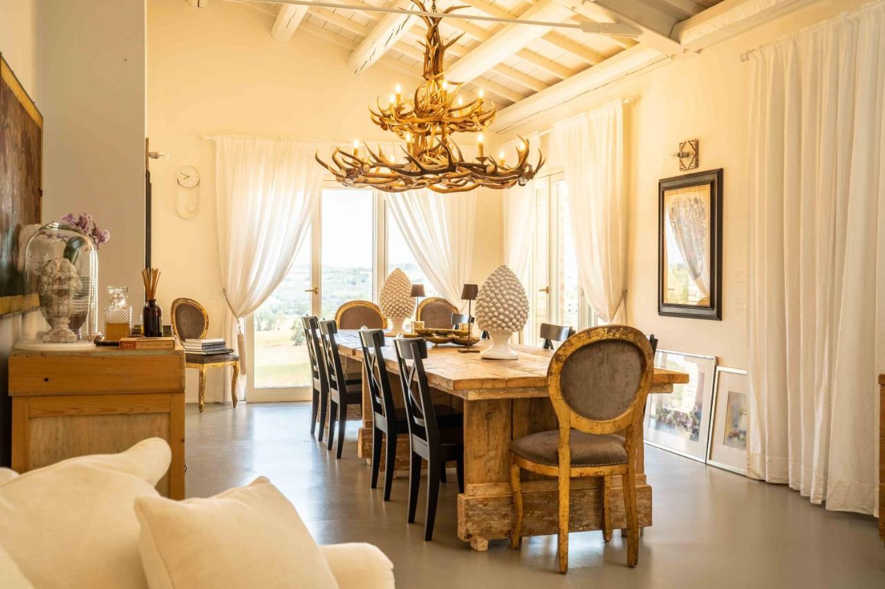 Casavostra - Ambience Suites Ostra Vetere Bagian luar foto