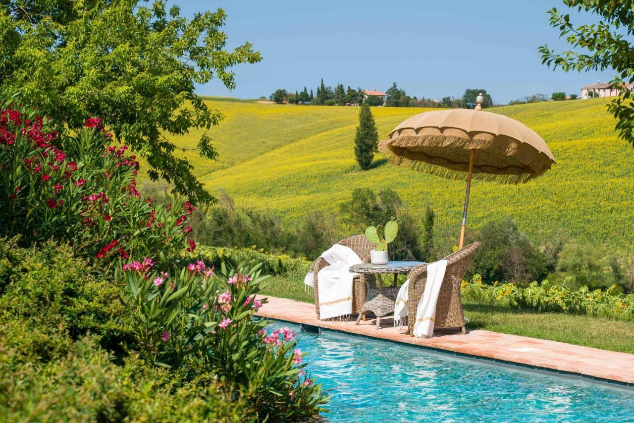 Casavostra - Ambience Suites Ostra Vetere Bagian luar foto