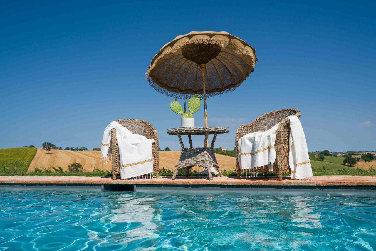 Casavostra - Ambience Suites Ostra Vetere Bagian luar foto