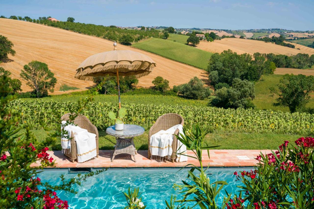Casavostra - Ambience Suites Ostra Vetere Bagian luar foto