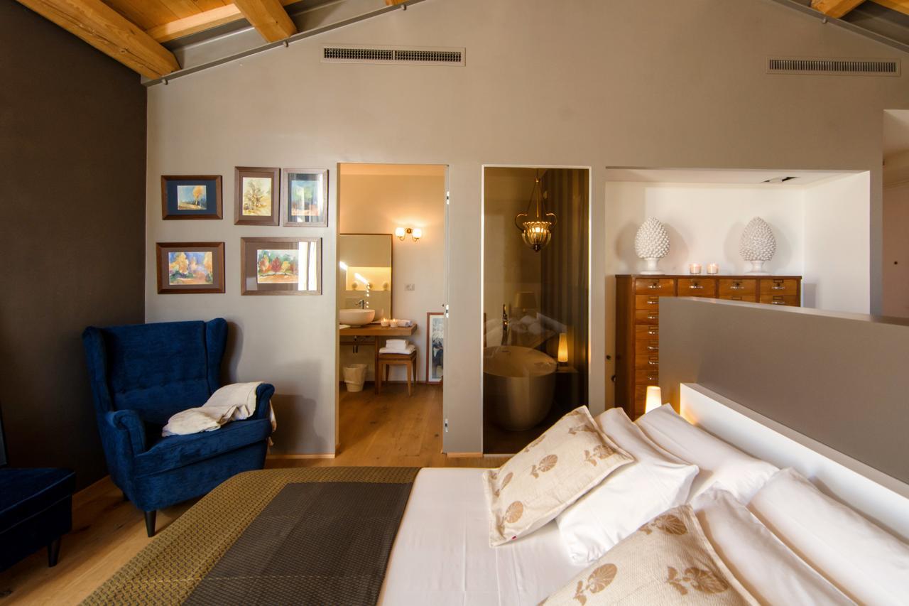 Casavostra - Ambience Suites Ostra Vetere Bagian luar foto